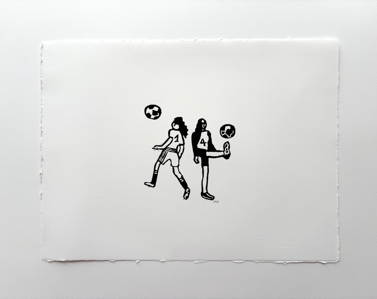 Girls playing soccer 2